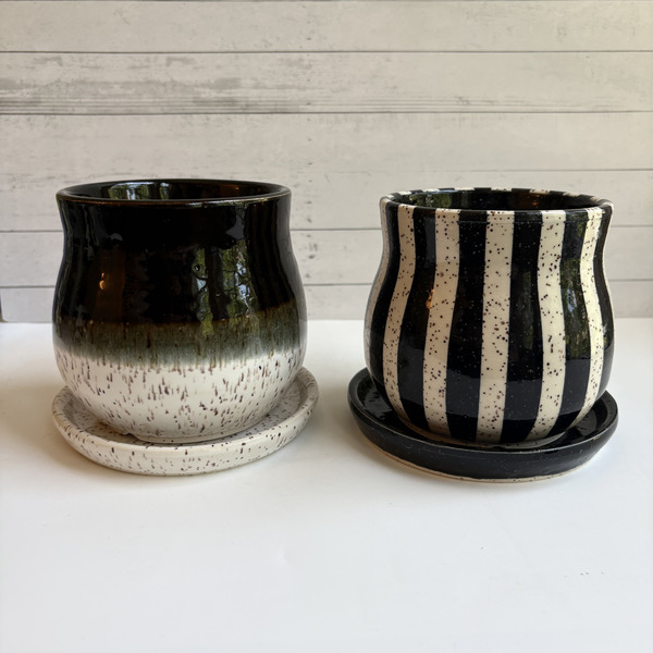 Pair of black & white speckled planters