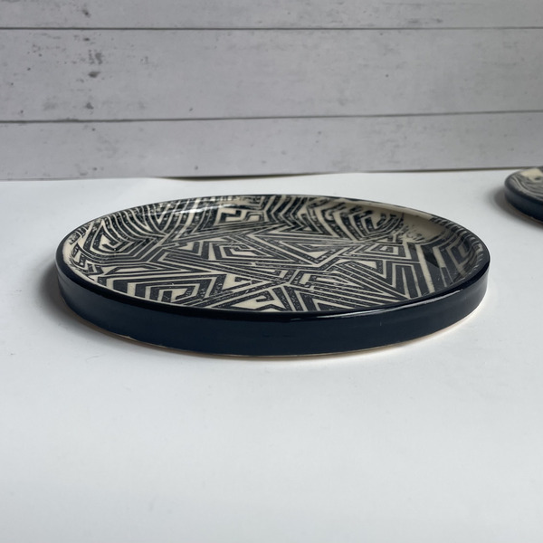 Small black & white patterned plates