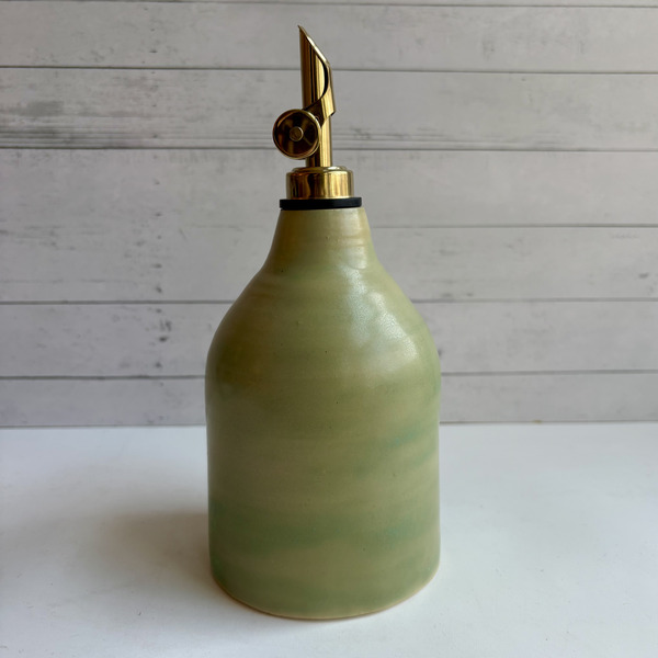 Black & white & matte green oil bottles