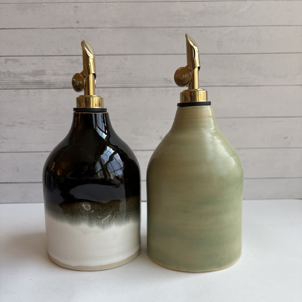 Black & white & matte green oil bottles