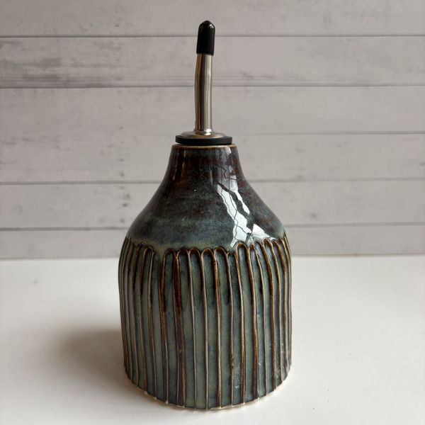 Blue fluted oil bottle