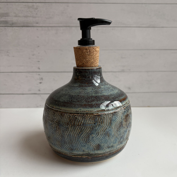 Blue textured soap dispenser